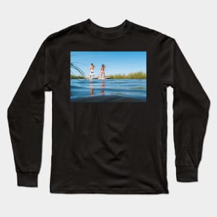 Man and woman stand up paddleboarding Long Sleeve T-Shirt